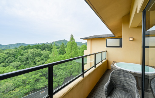 Take in epic views from the open-air hot spring and balcony unique to our top-floor guest rooms 